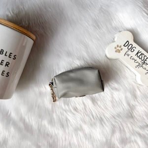 Elegant Gray Waste Bag Holder in a minimalist gray tone, a stylish and practical accessory for pet owners.