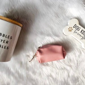Blush Pup Waste Bag Holder in soft blush pink, a stylish and practical accessory for pet owners.